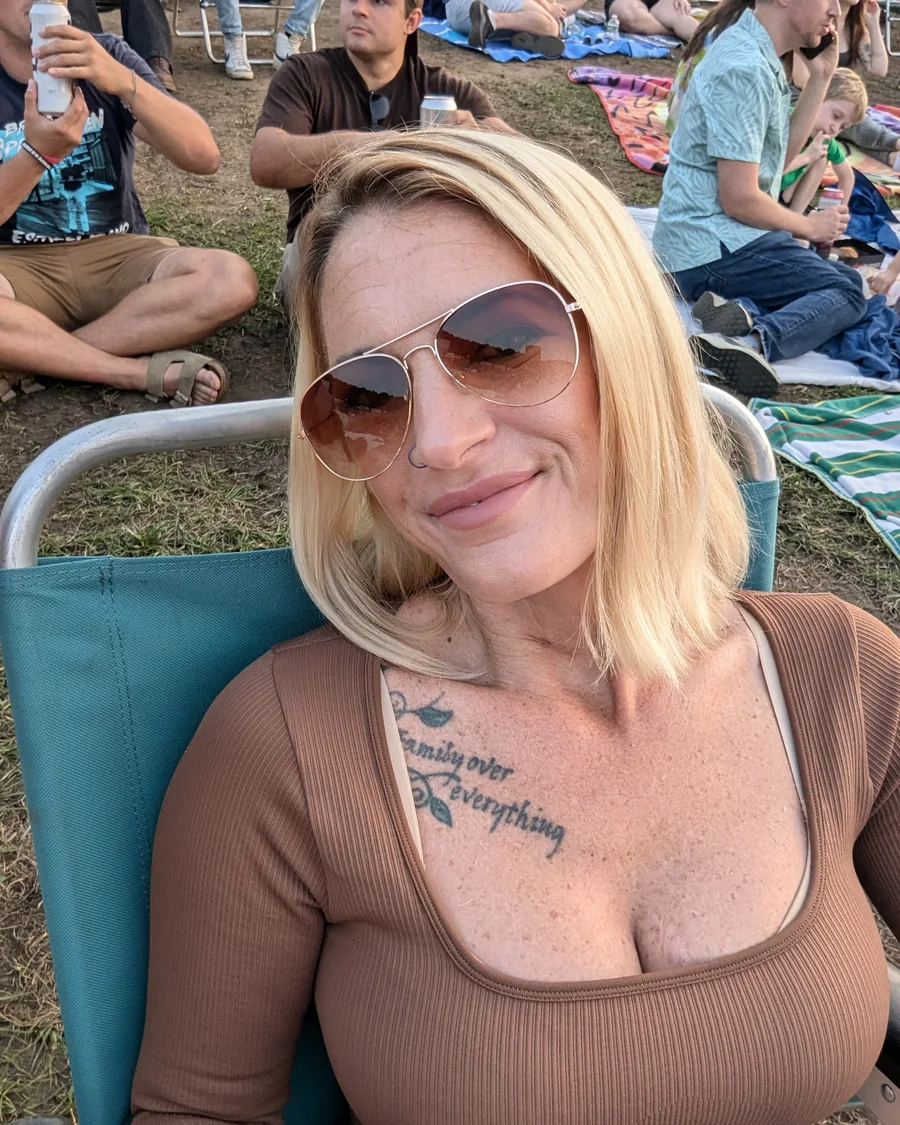 Amy smiling at an outdoor event