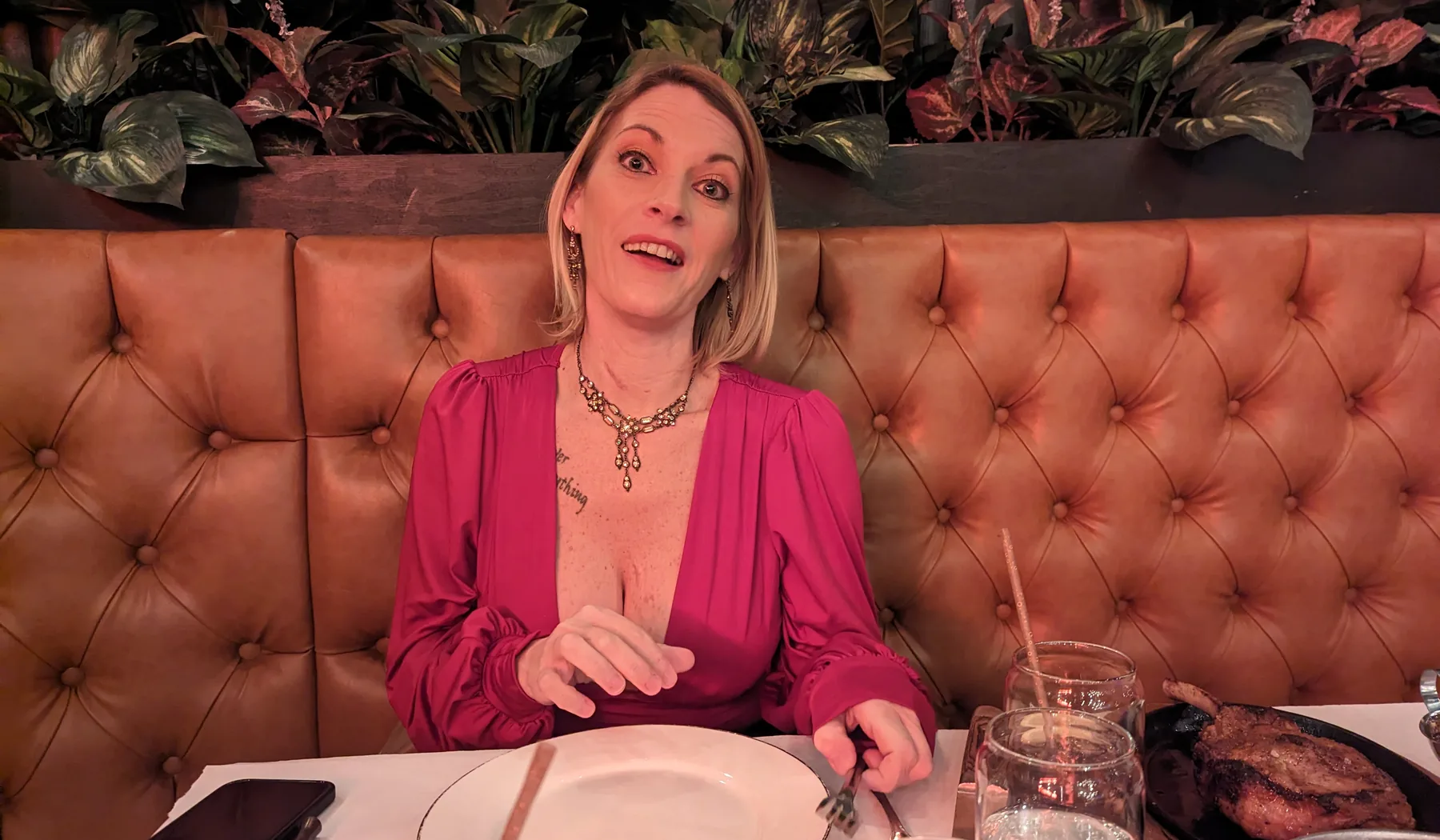 Amy Buttermaker seated in a booth for Jagaloons